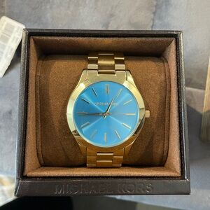 Michael Kors Women's Watch with Gold Band and Blue Dial